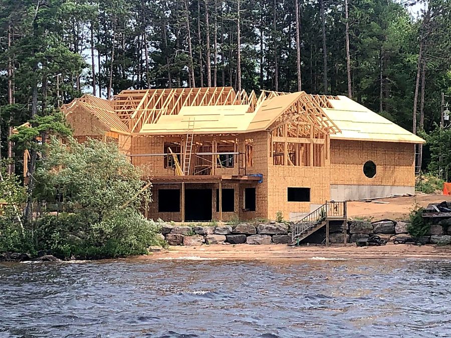 The house going up on Round Lake, seen from the water