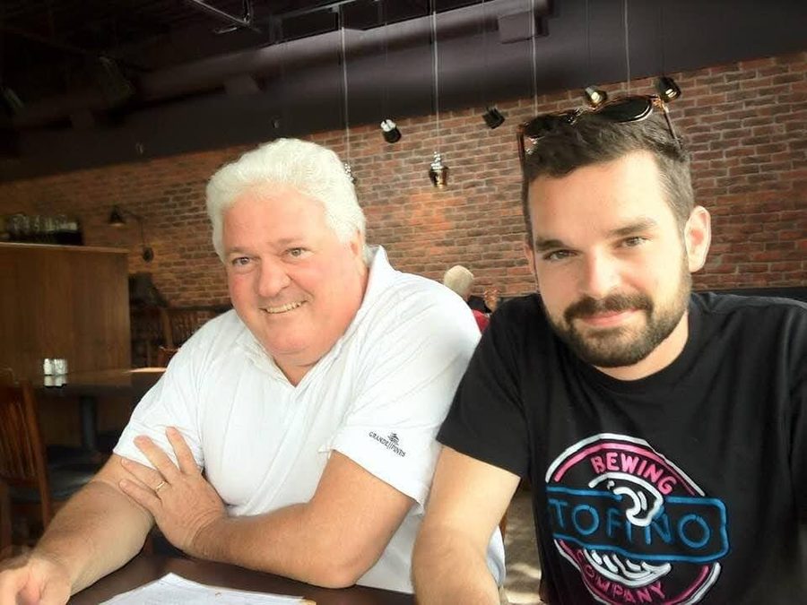 Ron with a son at a restaurant